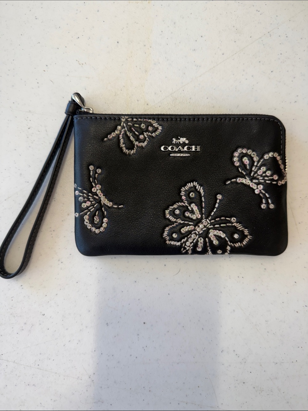 COACH Black Leather Wristlet with Sequin Butterfly Motif
